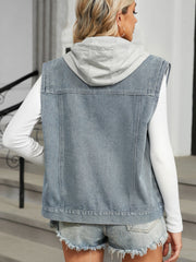 Denim vest with grey hooded back detail, buttoned front, casual women's outerwear.