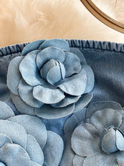Blue denim strapless dress with 3D floral applique detail
