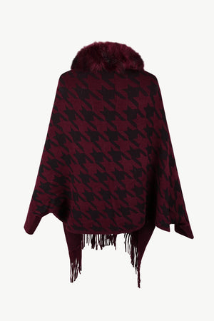 Burgundy houndstooth poncho with faux fur collar and fringe trim