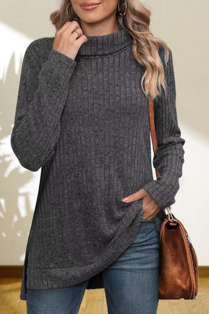 Charcoal ribbed knit turtleneck tunic top with long sleeves and side slit hem.
