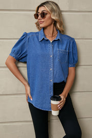 Royal blue denim button-down shirt with puff sleeves and a collared neckline.
