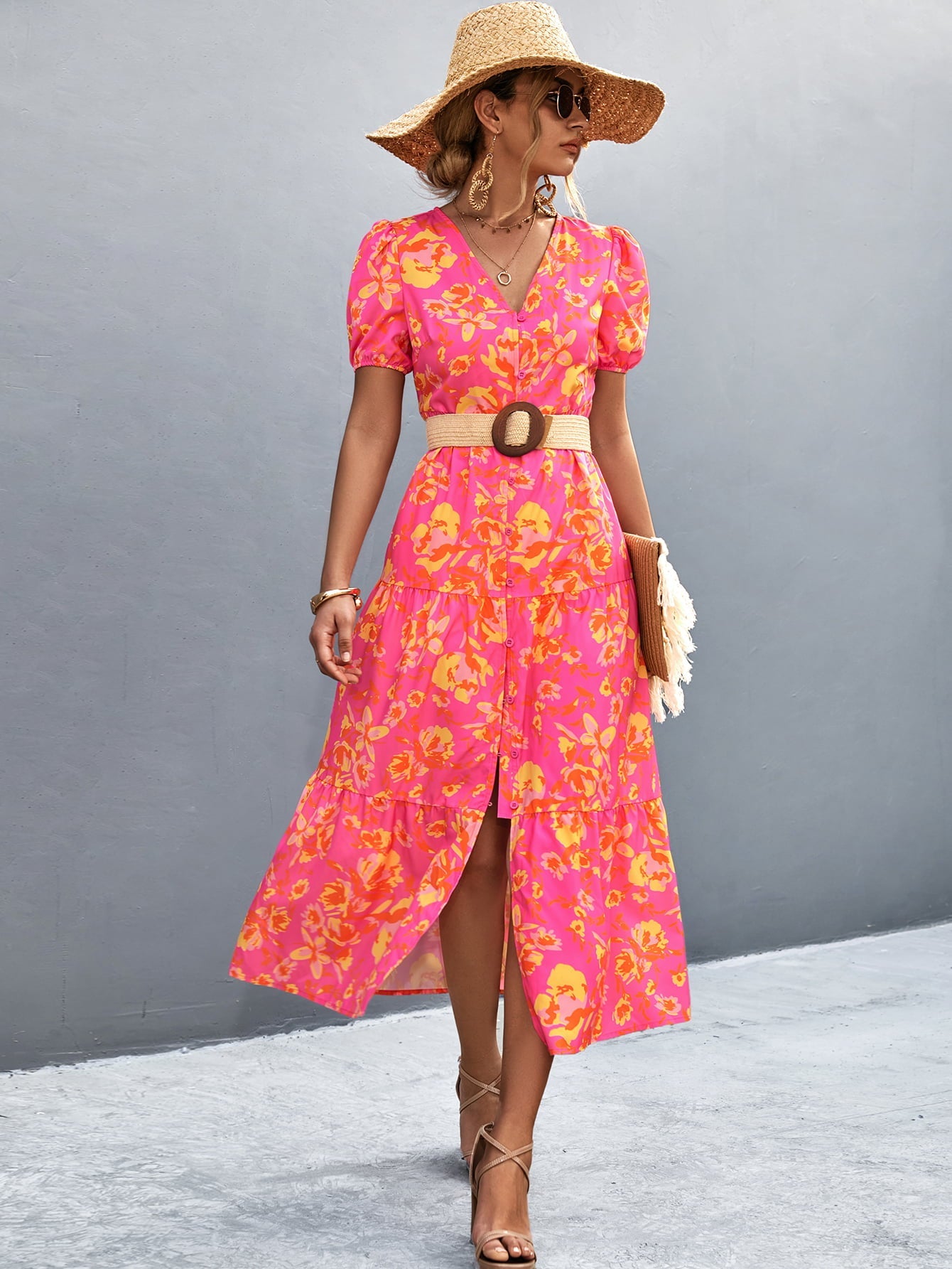 Hot pink floral print midi dress with puff sleeves and button front.