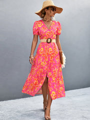 Hot pink floral print midi dress with puff sleeves and button front.