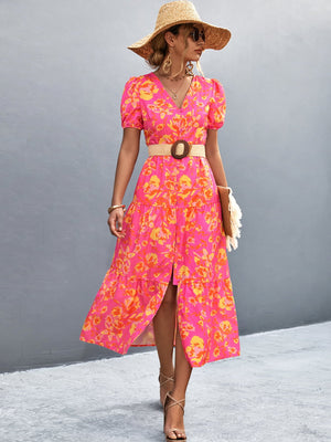 Hot pink floral print midi dress with puff sleeves and button front.