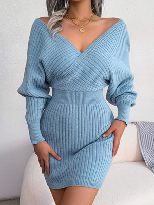 Sky blue acrylic wrap knit bodycon mini dress with V-neck and balloon sleeves.