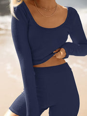 Textured ribbed scoop neck long sleeve crop top and shorts set in dark blue.