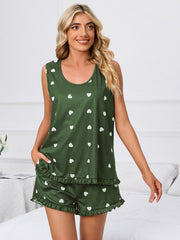 Army green heart print loungewear set with ruffled hem shorts and sleeveless top.