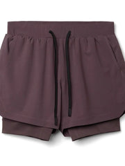 Layered performance shorts in plum purple with drawstring and perforated panels.