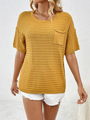 Textured knit t-shirt in mustard yellow with boxy silhouette and chest pocket.