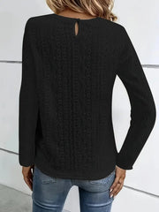 Black long sleeve blouse with eyelet embroidery and keyhole back detail.