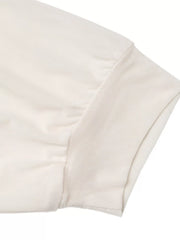 Cream long-sleeve bodysuit with ruched detail and ribbed cuff
