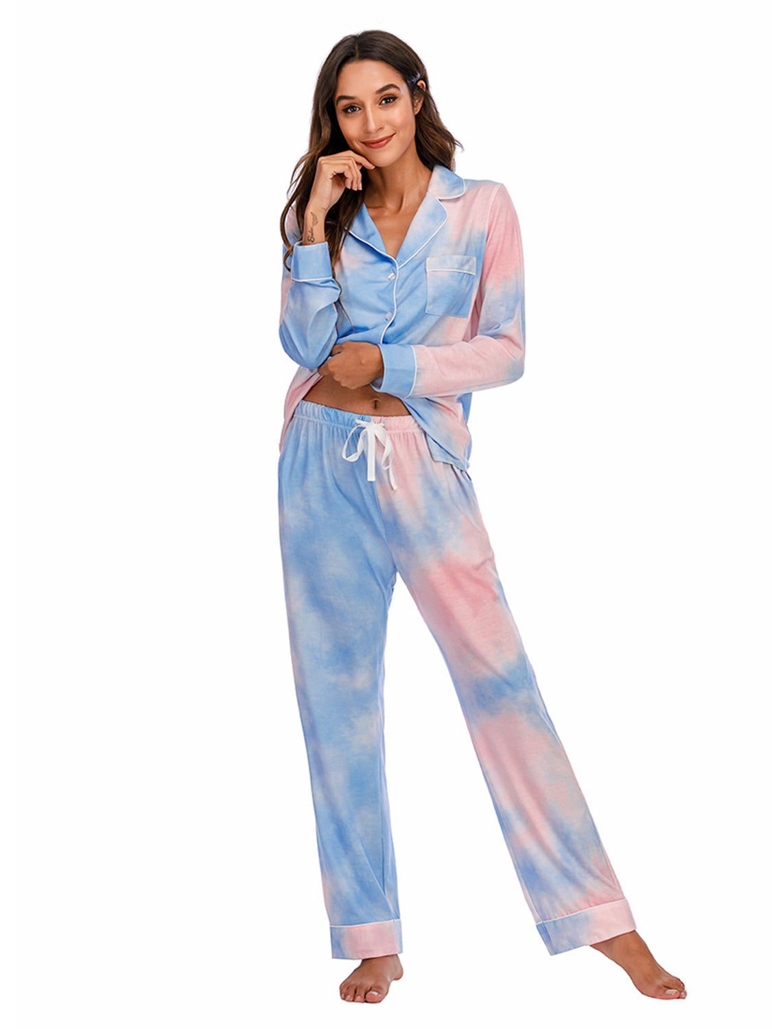Pajama set with tie-dye pink and blue print, piped trim, and pockets.