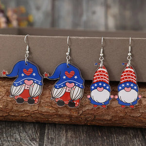 Patriotic gnome acrylic dangle earrings in royal blue with stars and hearts.