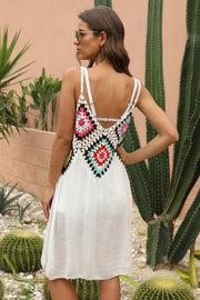 White maxi dress with colorful crochet yoke and spaghetti straps