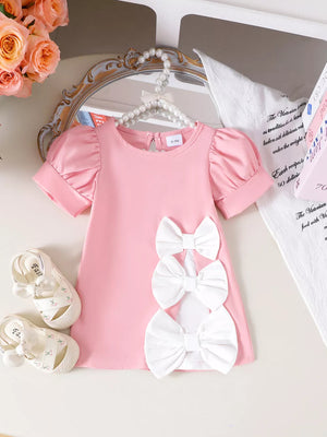 Children's Bow Puff Sleeve Dress in Pink, front view