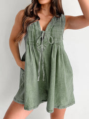 Moss green denim tie-front playsuit with V-neck and pleats