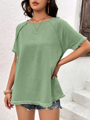 Light green raglan sleeve tee with fringed hem and cuffs.