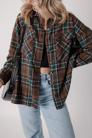 Plaid jacket in brown, green, and navy with button front and chest pockets.