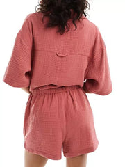 Crinkle cotton pajama set in red with elastic waist shorts and boxy top.