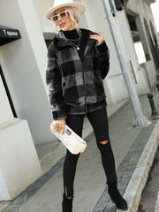 Charcoal plaid sherpa zip-up jacket with collared neckline and fuzzy texture.