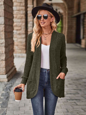 Dark green ribbed open-front cardigan with pockets and a relaxed fit.
