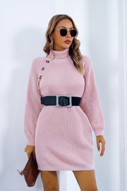 Pink knit turtleneck mini dress with button detail and black belt
