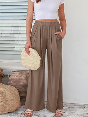 FlexiFit wide leg trousers in taupe with elastic waist and pockets, styled with a white crop top.