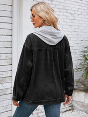 Oversized black denim jacket with grey hood detail, buttoned, casual, chic.