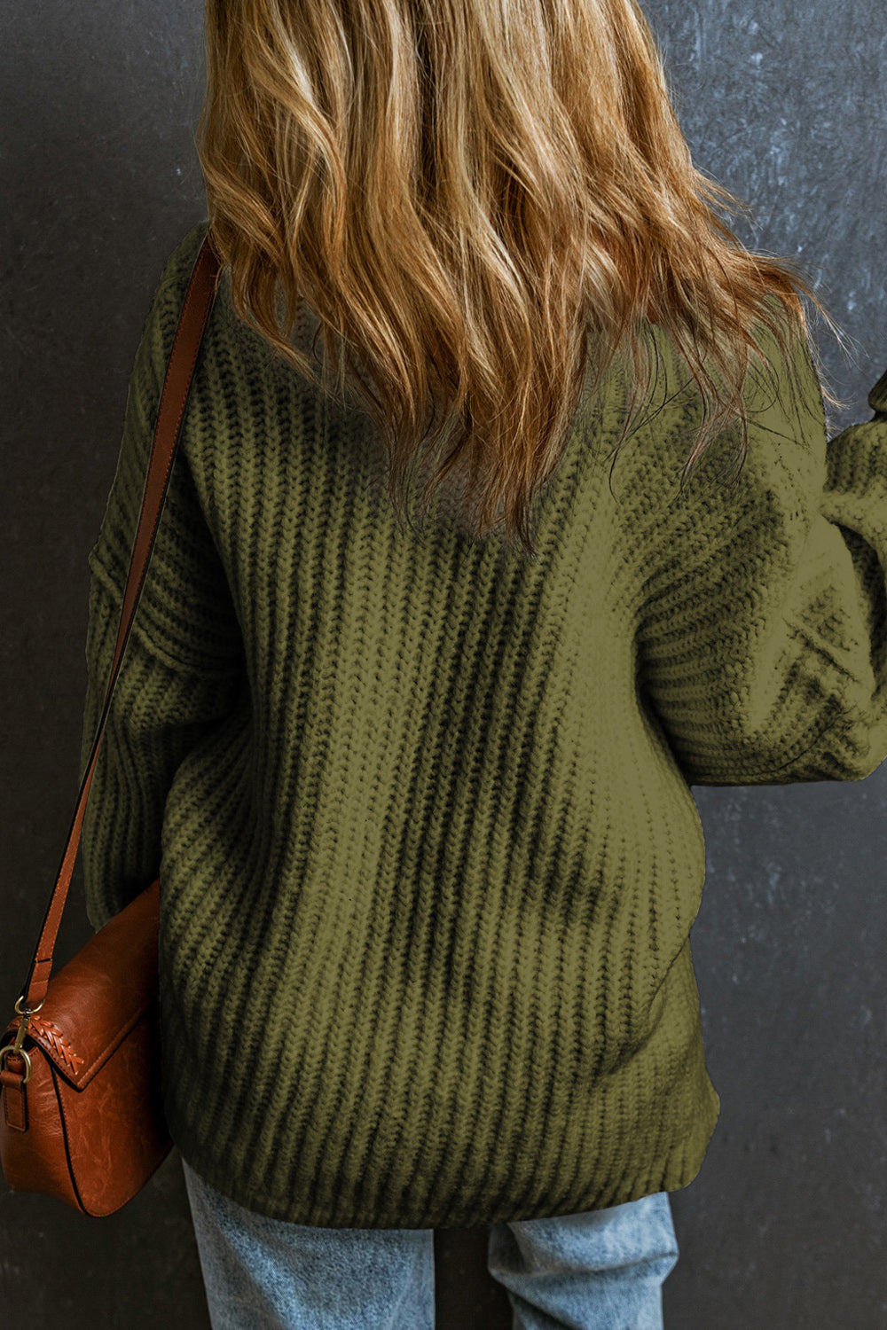 Moss green chunky ribbed knit sweater with wide neckline, acrylic material.
