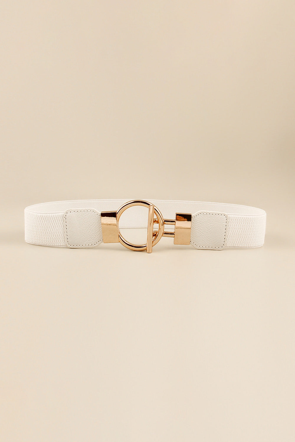 White elastic belt with gold ring buckle and toggle closure