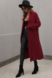 Textured knit maxi cardigan in wine with pockets, open front and long sleeves.