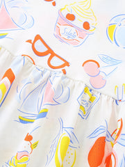Toddler A-line dress with playful summer print, featuring sailboats, ice cream, sunglasses, and fruit on white cotton.