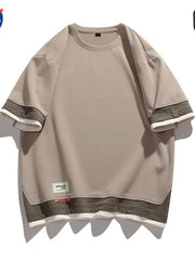 Men's beige cotton blend t-shirt with contrast stitching on sleeves and hem.