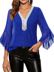 Blue sequin v-neck blouse with flared mesh sleeves and a glitter sparkle detail.