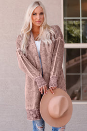 Pink textured puff sleeve open cardigan with contrasting cuffs and hem
