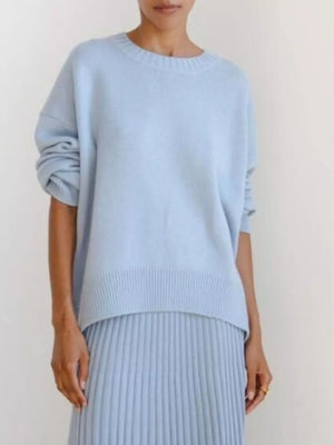 Light blue soft knit sweater with ribbed detailing and crew neck.