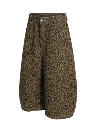 Men's brown leopard print wide-leg capris with a button and zip fly.