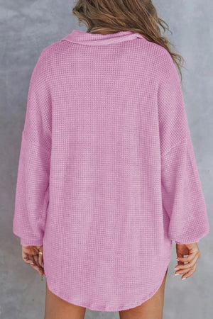 Waffle knit henley shirt in lilac with long sleeves and a collared neckline.