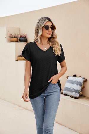 Black v-neck knit top with perforated sleeve detail