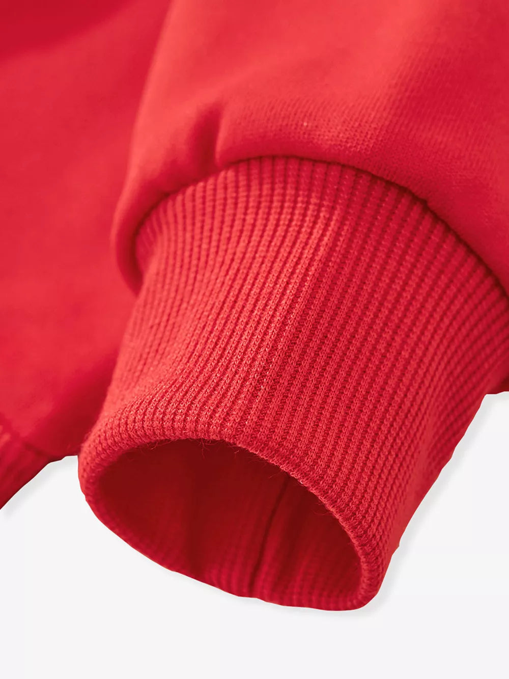 Red kids sweatshirt cuff detail, ribbed knit trim, comfortable cotton blend.