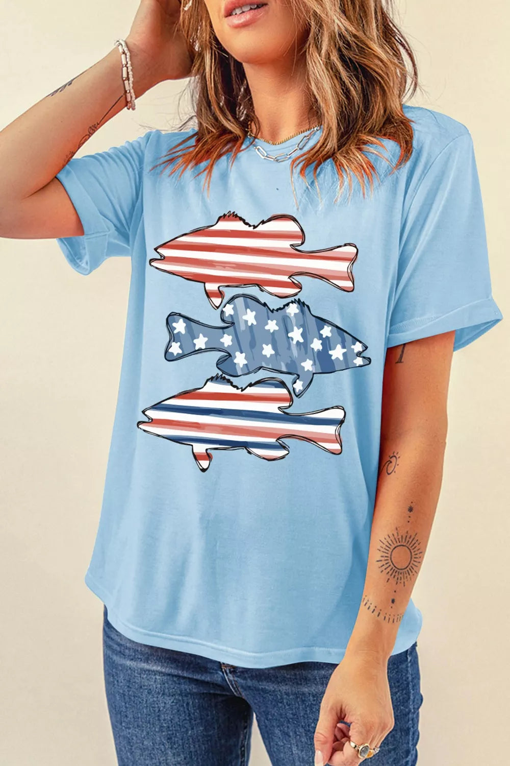Light blue t-shirt with patriotic fish graphic.