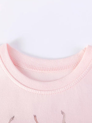 Blush pink cotton toddler dress with ballerina graphic and crew neck.