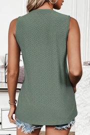 Sleeveless shell top in Matcha Green with allover diamond texture.
