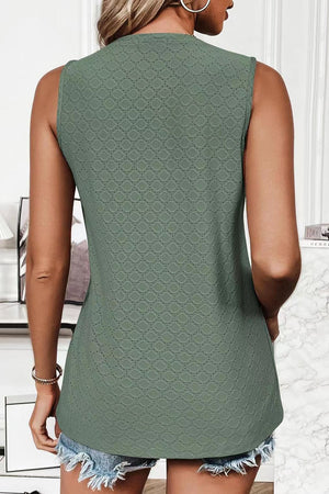 Sleeveless shell top in Matcha Green with allover diamond texture.