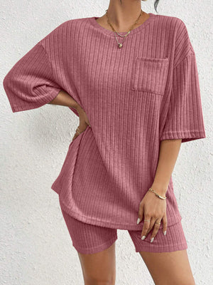 Relaxed ribbed lounge set in Dusty Pink with a chest pocket and short sleeves.