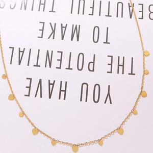 Gold heart charm chain necklace with dangling hearts