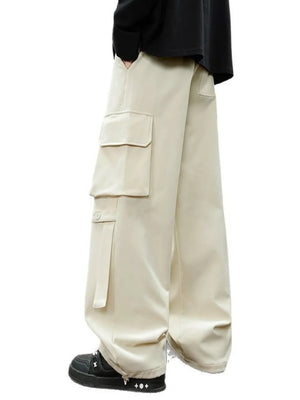 Light brown cargo pants with multiple flap pockets and drawstring detail.