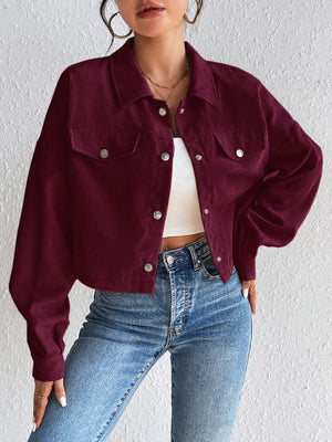Burgundy corduroy cropped jacket with snap front and chest pockets