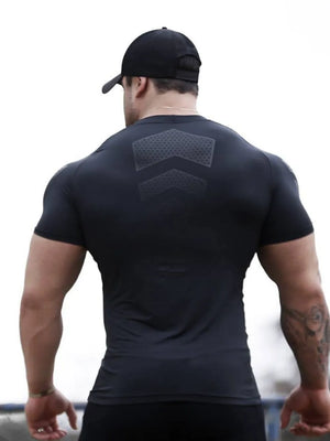 Black performance mesh sculpt tee with chevron detail on back.