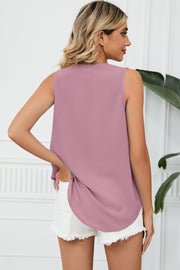 Lace-trimmed V-neck tank top in Dusty Pink with a curved hem.
